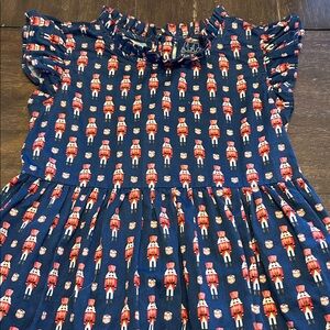 TUKTUK Designs Navy with Christmas Nutcrackers Ruffle Sleeve Cotton Dress